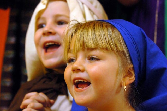 Pupils Shannon Hubby (Mary) and Jacob Loftus (Joseph) from St Gregory's school perform a nativity scene to senior citizens at Woodview Community Centre in Swarcliffe in December 2004.
