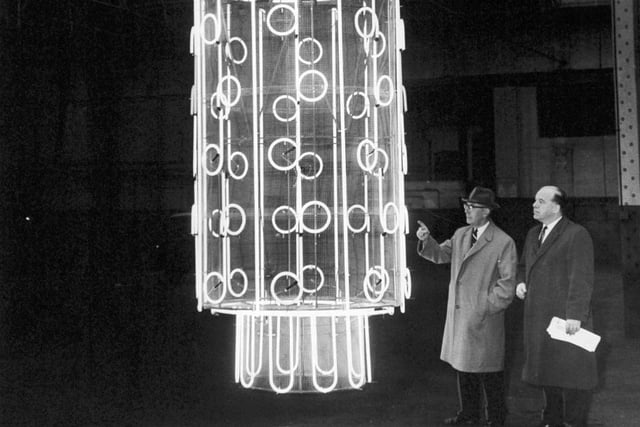 Leeds traders were invited to see six colour illuminated lanterns which will give the city a "magic wonderland" touch during Christmas in 1962. Pictured in a Leeds bus garage is one of the lanterns - as tall as a double deck bus  - and lit up for the visitors.