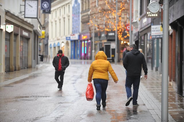 For most of the day the high street remained deserted, with only a few shoppers venturing outside to face the cold weather.