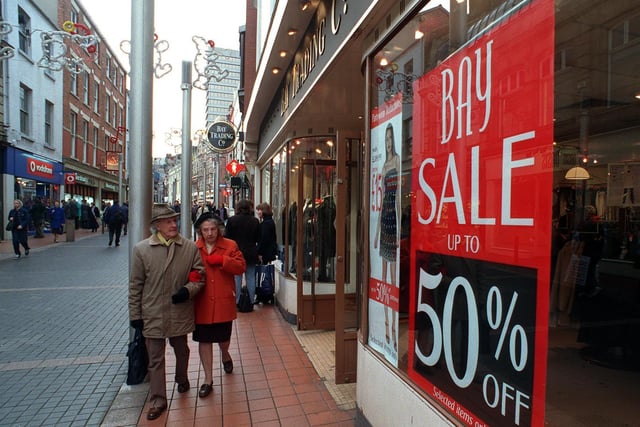 Shoppers walk down Commercial Street in the city centre on the lookout for bargains in December 1998.