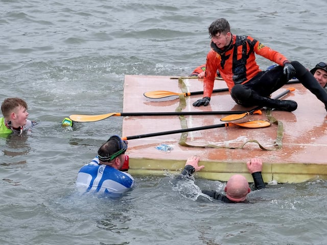 Shouldn't there be three people on a raft?