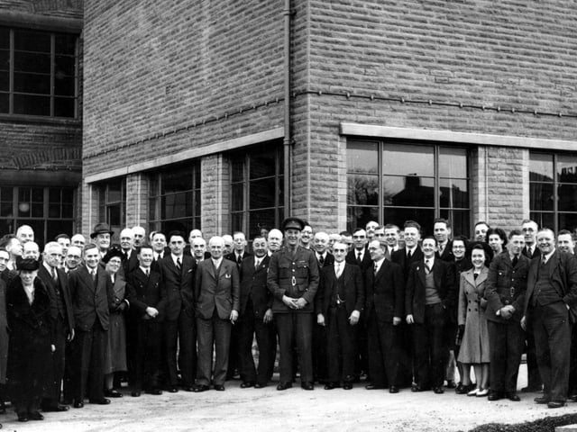 A group photograph showing people present at the official opening of the extension to the council offices in Rothwell in March 1940.
