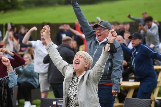 July - Football fans at the Newton Arms celebrate a goal during the England v Ukraine Euro 2020 Quarter Final match