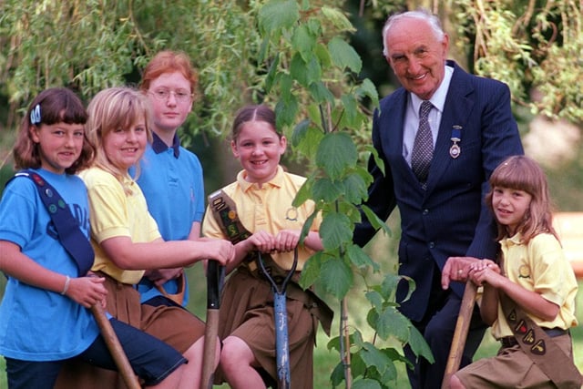 Former Mayor of Pudsey Douglas Moritt with guides and brownies of Pudsey 3rd and 4th packs planting a tree in Pudsey Park. Piuctured, from left, is Laura Kilburn, Abigail Ducker, Corinne Dwyer, Colette Higgins, and on right Gemma Kilburn.