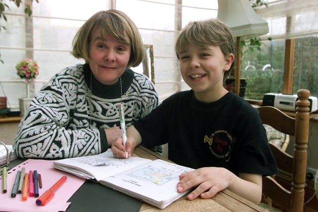 February 1999 and Jack P. Shepherd pictured doing his homework with mum Janet at their home in Pudsey. He would go on to star in Coronation Street.