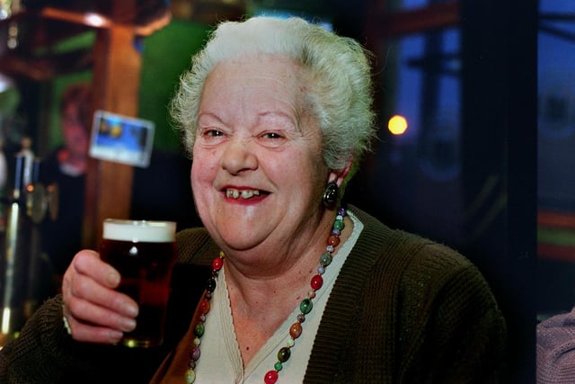 This is Gertie Wood celebrating her 80th birthday with a glass of bitter at the Royal Hotel in Pudsey in August 1998.
