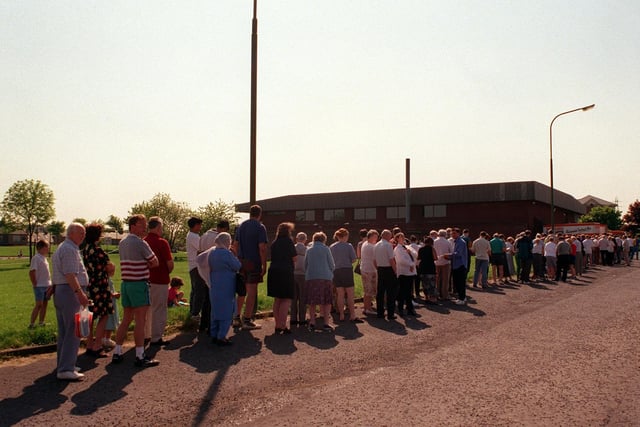People stand patiently in line for a bargain when Pudsey Civic Centre held an auction in May 1998.