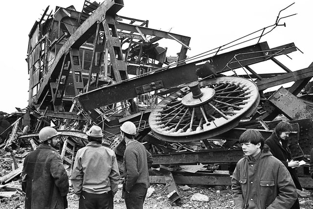 The demolition of the 200 feet high Mosley Common winding tower at Boothstown on Saturday 26th of January 1974.  The pit had closed down in 1968.