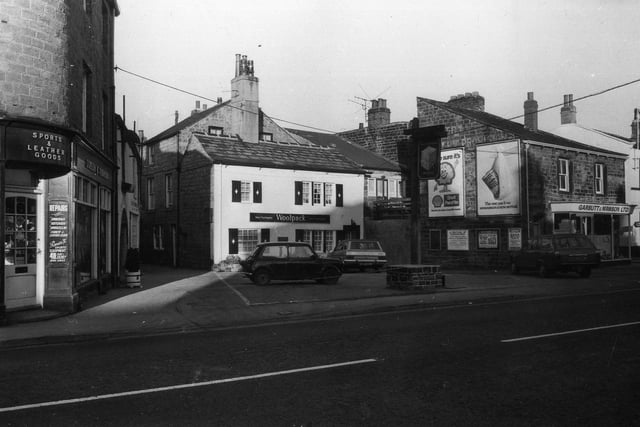 Bondgate showing the Woolpack public house in the centre. The Grade II listed building dates back to at least the 18th century when it was built as a dwelling house. It was later converted to an inn and was known as the King's Arms around 1827 but had become the Woolpack by 1861.