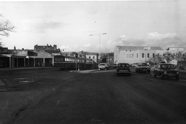 Crossgate showing Otley bus station on the left in 1976. The photo was taken before the bus station was greatly reduced in size, the far end being built upon to become part of the Orchard Gate Shopping Centre. On the right of the picture is Presto supermarket by the junction with Boroughgate, while Nelson Street leads off on the far right.