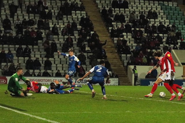 Cole Stockton scores his second goal to leave Morecambe 3-2 behind