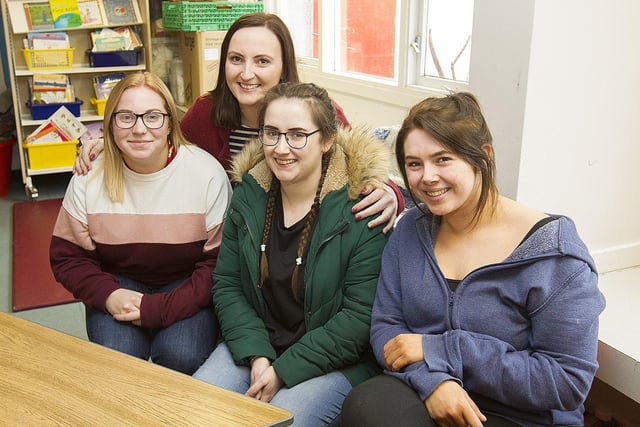 Past puplils Katie Robinson, Gemma Yourston, Fiona Haye and Iona Stewart take a seat in their old classroom.