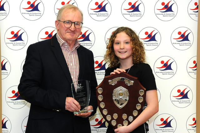 Auchmuty High School's Ruby McDonald was awarded the Garry Innes Memorial Shield after a year in which she excelled at both swimming and athletics. make the presentation was President of Disability Sport Fife, Richard Brickley OBE.