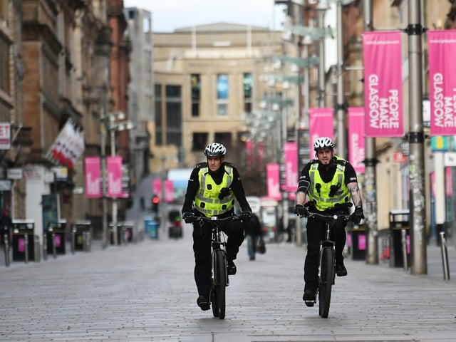 Police officers on bikes on Buchanan Street.