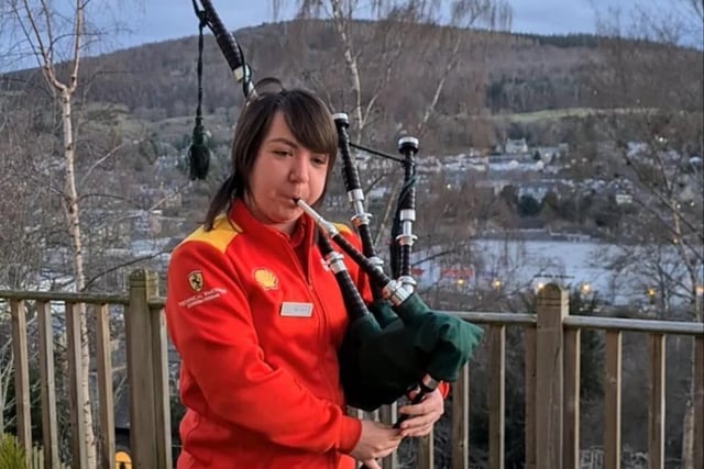 Melissa Garrie, who works at Wilderhaugh petrol station, player her pipes in Galashiels.