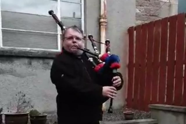 Jedburgh piper Tosh MacDonald plays from his home in Bongate Gardens.