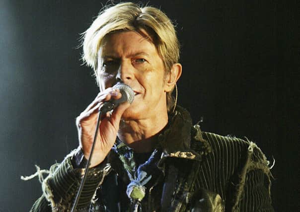David Bowie performing at the 2004 Isle of Wight Festival. (Photo by Jo Hale/Getty Images)