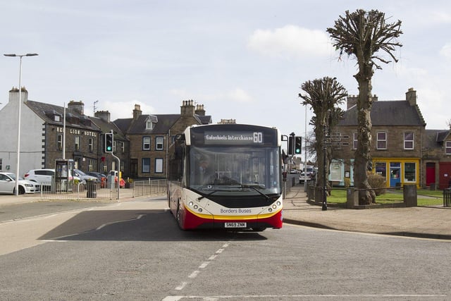 A bus travels through a deserted Earlston. (not St Boswells as in file name)