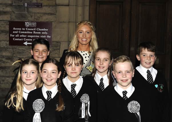 Amy Thomsom with young dancers from Burgh Primary School where she works as a teacher.