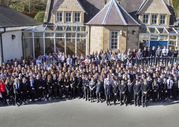 Pupils leave the old JGS building for the final time.