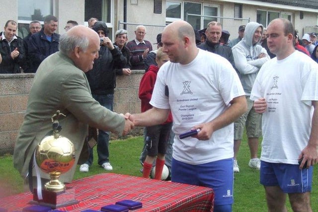 Local lad Ross Dorward receives his Premier League winner's medal in 2011