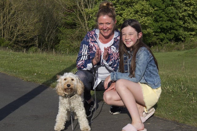 Shirley and Rena Clamp take time to join the appauld in Hawick with their pooch Lucy.