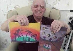 Bobby Pringle enjoys receiving artwork at Bonchester Bridge Care Home.