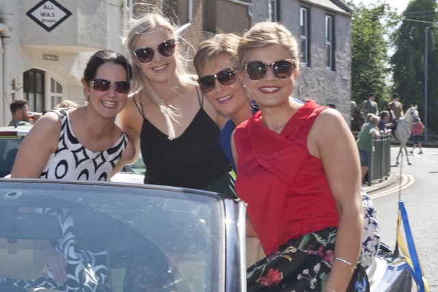The ladies led the parade into Denholm in an open top car bmcb 54