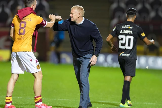 Livi manager Gary Holt greets David Turnbull after full-time