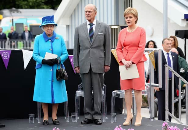 Queen Elizabeth II declaring the Borders Railway open on September 9, 2015, accompanied by the Duke of Edinburgh and Nicola Sturgeon.  (Photo by Chris Jackson/Getty Images)