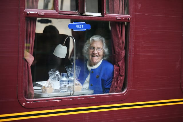 Rail campaigner Madge Elliot on board the train carrying the Queen to Tweedbank five year ago.  (Photo by Andrew Milligan/WPA pool/Getty Images)