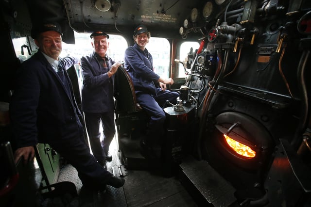 Crew Tony Jones, Jim Smith and driver Steve Hanczar on board the train on September 9, 2015, in Edinburgh.  (Photo by Andrew Milligan/WPA pool/Getty Images)