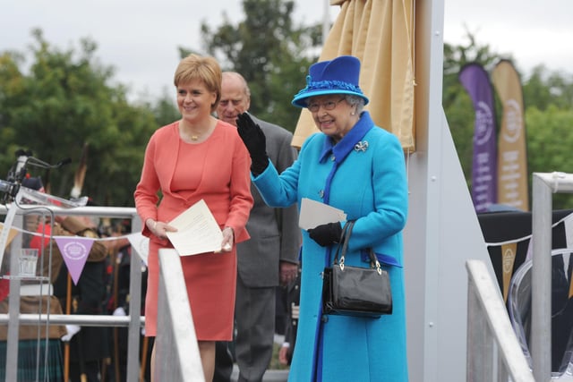 Nicola Sturgeon and the Queen make their way onto the stage for the official opening of the Borders Railway. Photo: Kimberley Powell