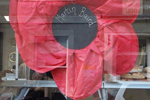 Melrose schoolchildren made huge tissue poppies, and sold them to businesses and homes in the town to raise funds for Poppy Scotland. Photo: Douglas Hardie