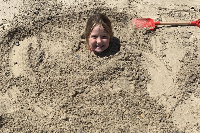 Phoebe, six, enjoying the beach in Littlehampton