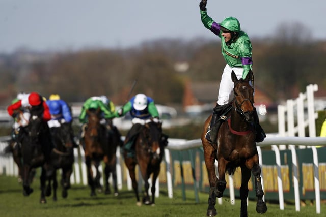 Winning the Grand National on Mon Mome / Picture: Getty