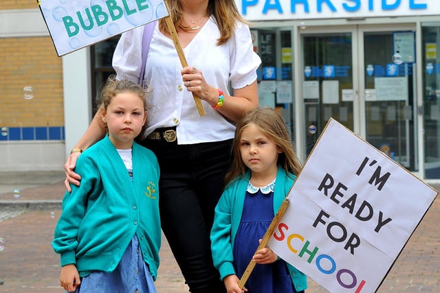 Children,parents and school staff protesting after WSCC didn't support Heron Way and Kingslea reopening. Amy Hardwick with daughters Primrose and Mabel. Pic Steve Robards SR2006291 SUS-200629-133545001