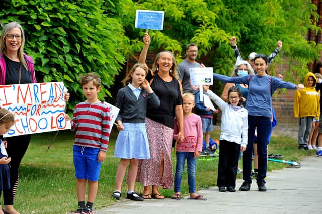 Children,parents and school staff protesting after WSCC didn't support Heron Way and Kingslea reopening. Pic Steve Robards SR2006291 SUS-200629-133533001