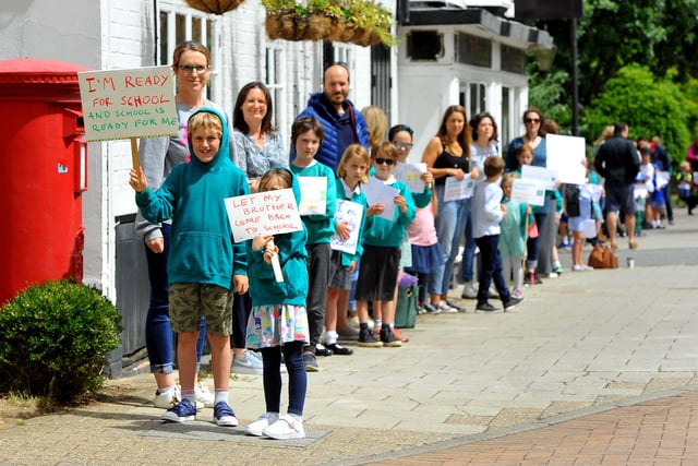 Children,parents and school staff protesting after WSCC didn't support Heron Way and Kingslea reopening. Pic Steve Robards SR2006291 SUS-200629-133507001