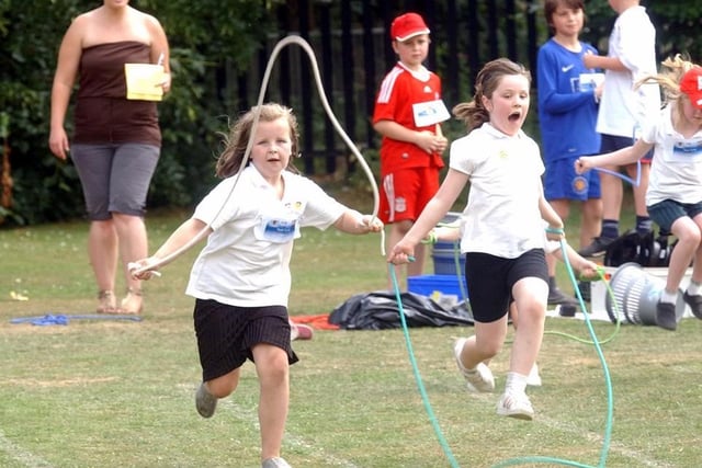 Children take part in a skipping race at Corby Old Village Primary School in July 2009. Photo by Doug Easton.