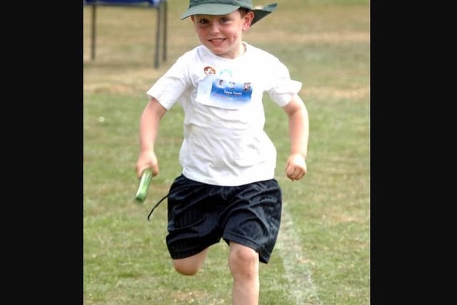 A relay runner at Corby Old Village Primary school in July 2009. Photo by Doug Easton
