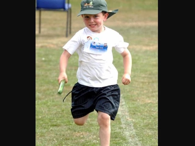 A relay runner at Corby Old Village Primary school in July 2009. Photo by Doug Easton