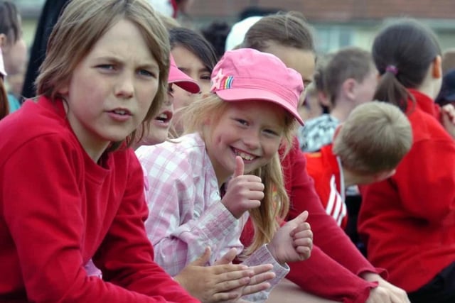Children cheer on their classmates at Corby Old Village Primary School in June 2008. Photo by Alison Bagley