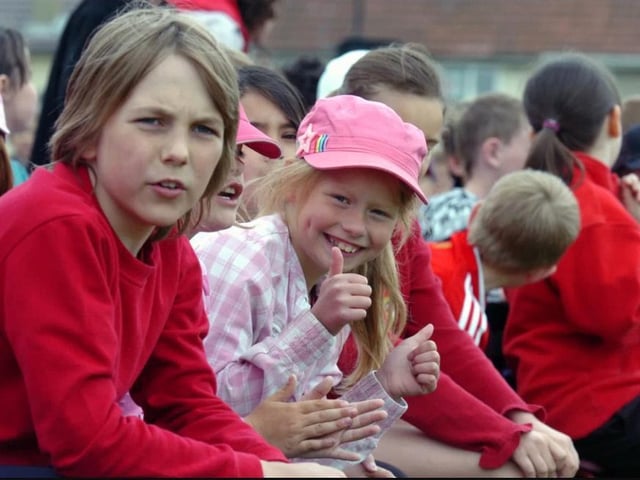 Children cheer on their classmates at Corby Old Village Primary School in June 2008. Photo by Alison Bagley
