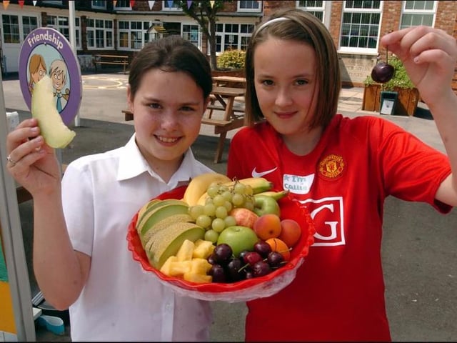 Sarah Rose and Callie Brock, then aged 11, eating healthily at Corby Old Village Primary School sports day in 2009. Photo by Alison Bagley