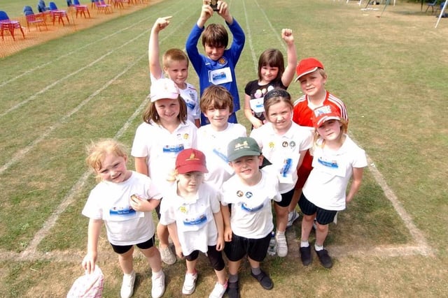 Corby Old Village Primary School celebrate their trophy at sports day in 2009. Photo by Doug Easton