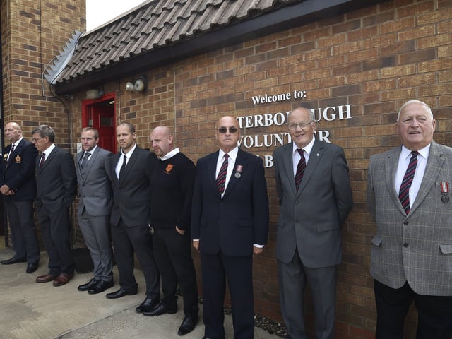Mourners attend the funeral of Will Baker