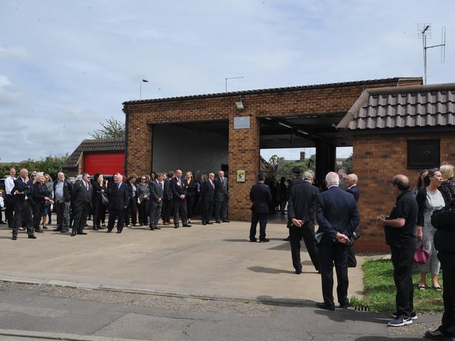 Mourners attend the funeral of Will Baker