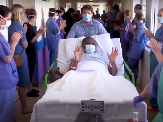 Husband and wife Clarence and Stella Diribe were clapped as they left critical care at Eastbourne DGH together