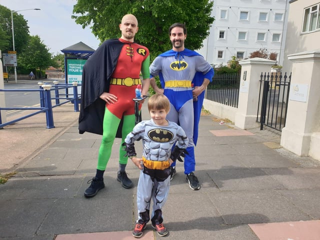 Alex Rico and John Haynes ran a half marathon dressed as Batman and Robin for the The Tuesday OHara Fund and NHS Charities
